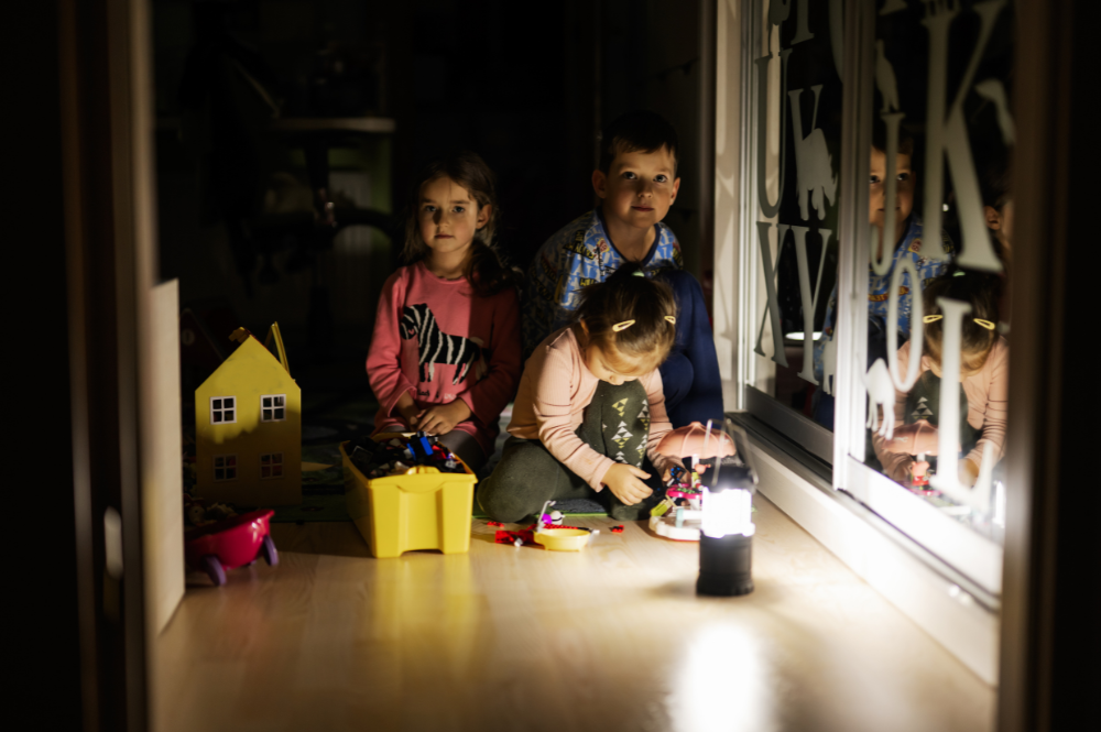Image of a family inside a home during a blackout.